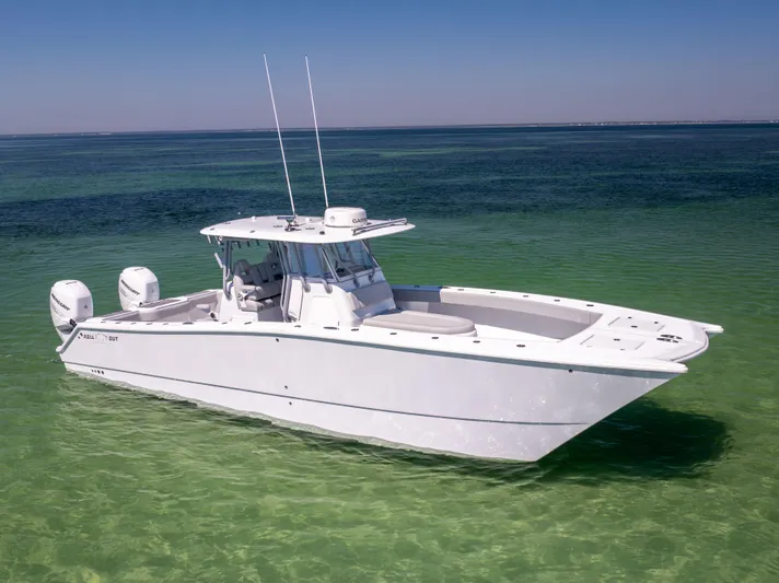  Yacht Photos Pics Freeman 34VH 2022 boat on clear turquoise water, featuring twin engines and sleek design.