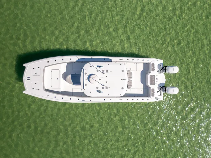  Yacht Photos Pics Aerial view of 2022 Freeman 34VH boat on green water.