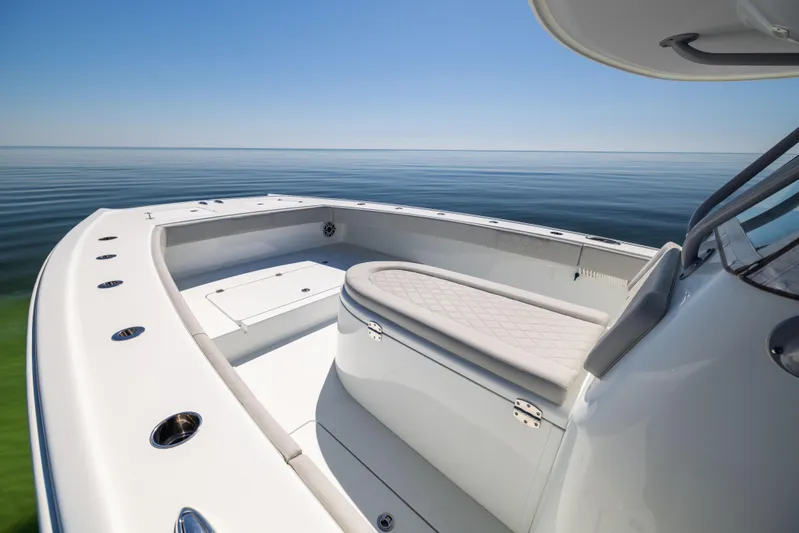  Yacht Photos Pics 2022 Freeman 34VH boat on calm sea, showcasing sleek design and spacious deck.