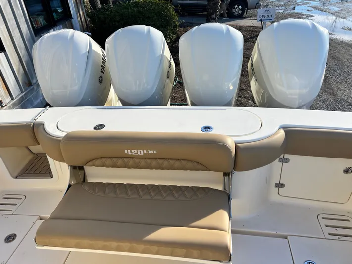  Yacht Photos Pics 2017 Scout 420 LXF boat with four Yamaha outboard engines and tan seating.