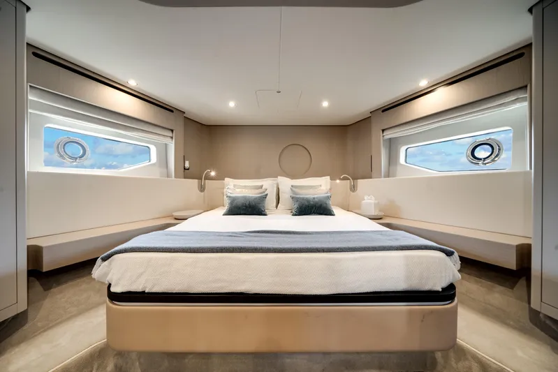 Spysea Yacht Photos Pics Luxurious bedroom interior of 2023 Azimut Fly 68 yacht with modern design and large windows.