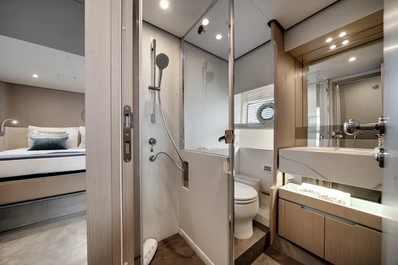 Spysea Yacht Photos Pics Luxurious bathroom and bedroom interior of 2023 Azimut Fly 68 yacht.