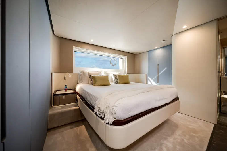 Spysea Yacht Photos Pics Luxurious bedroom interior of 2023 Azimut Fly 68 yacht with modern design and elegant furnishings.