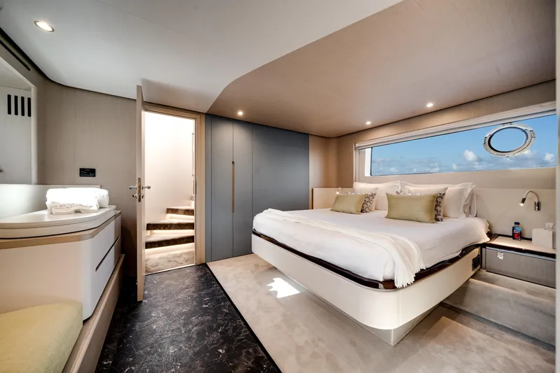 Spysea Yacht Photos Pics Luxurious bedroom interior of 2023 Azimut Fly 68 yacht with ocean view.