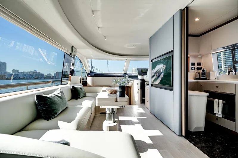 Spysea Yacht Photos Pics Luxurious interior of 2023 Azimut Fly 68 yacht with modern design and city skyline view.