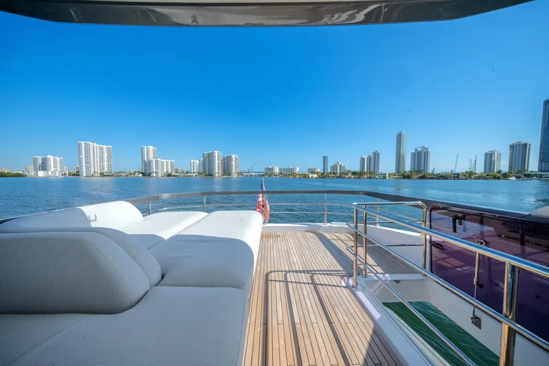 Spysea Yacht Photos Pics Luxurious 2023 Azimut Fly 68 yacht deck with city skyline view.