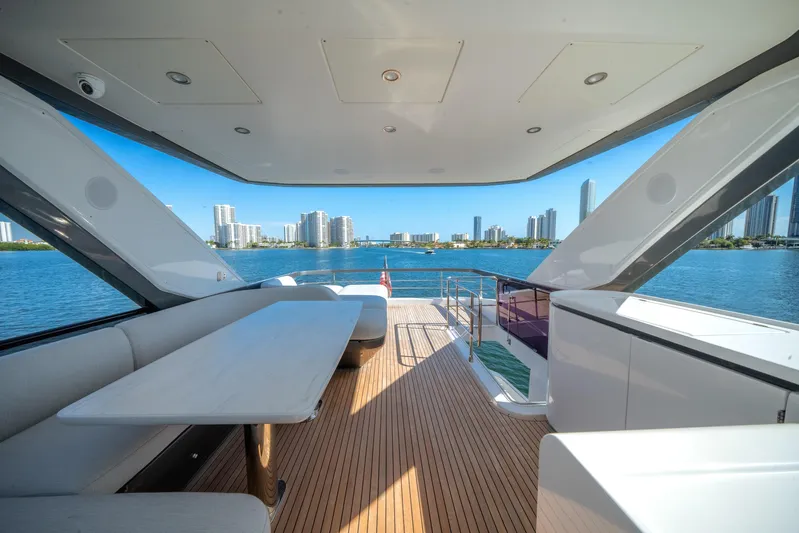 Spysea Yacht Photos Pics Luxurious 2023 Azimut Fly 68 yacht deck with city skyline view.