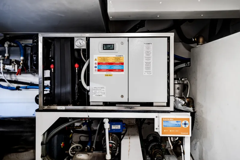 Spysea Yacht Photos Pics Engine room of 2023 Azimut Fly 68 yacht, featuring advanced control systems.