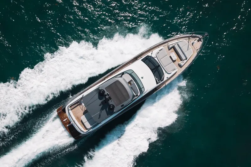 Spysea Yacht Photos Pics Aerial view of 2023 Azimut Fly 68 yacht cruising on the ocean.
