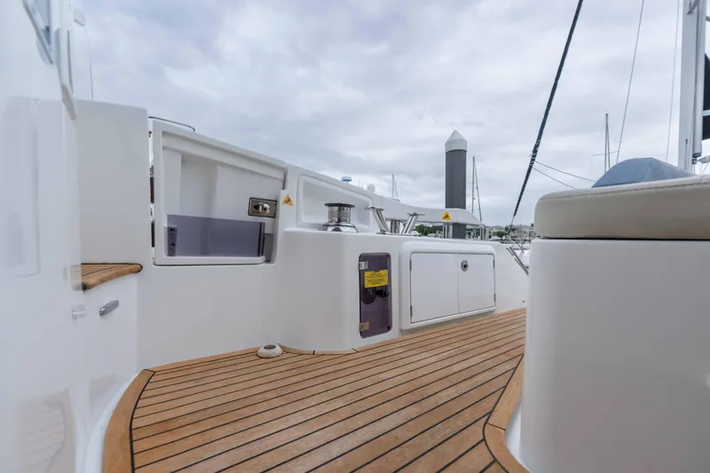 Treasure X Yacht Photos Pics 2015 Azimut 55S yacht deck with teak flooring and sleek design elements.