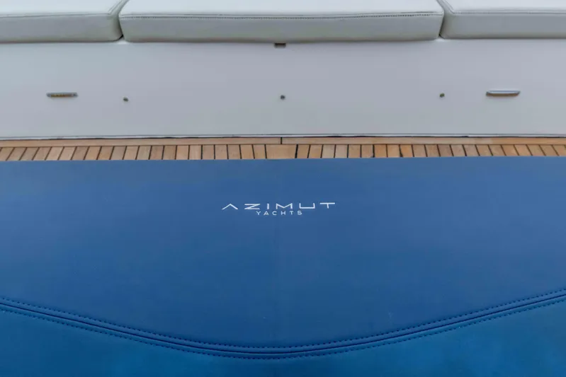 Treasure X Yacht Photos Pics 2015 Azimut 55S yacht deck with branded blue cushion.