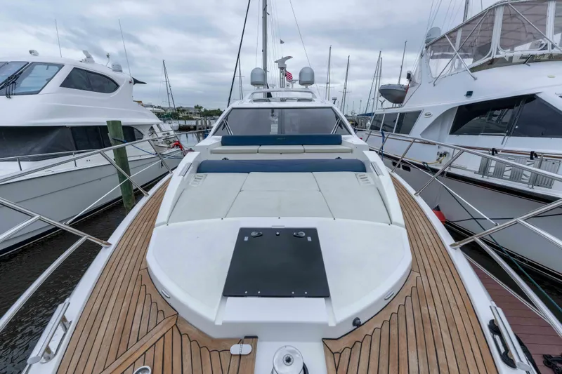 Treasure X Yacht Photos Pics 2015 Azimut 55S yacht docked, featuring sleek design and spacious deck.