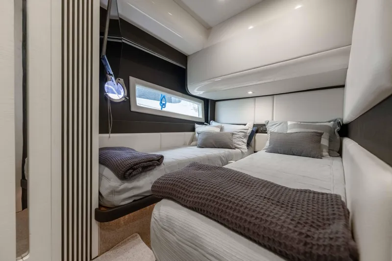 Treasure X Yacht Photos Pics Luxurious twin cabin interior of 2015 Azimut 55S yacht with modern design.