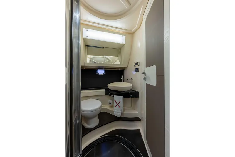 Treasure X Yacht Photos Pics Luxurious bathroom in 2015 Azimut 55S yacht with modern fixtures and elegant design.