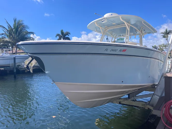  Yacht Photos Pics 2018 Grady-White Canyon 336 boat docked on a sunny day.