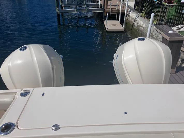  Yacht Photos Pics 2018 Grady-White Canyon 336 boat engines docked by the water.
