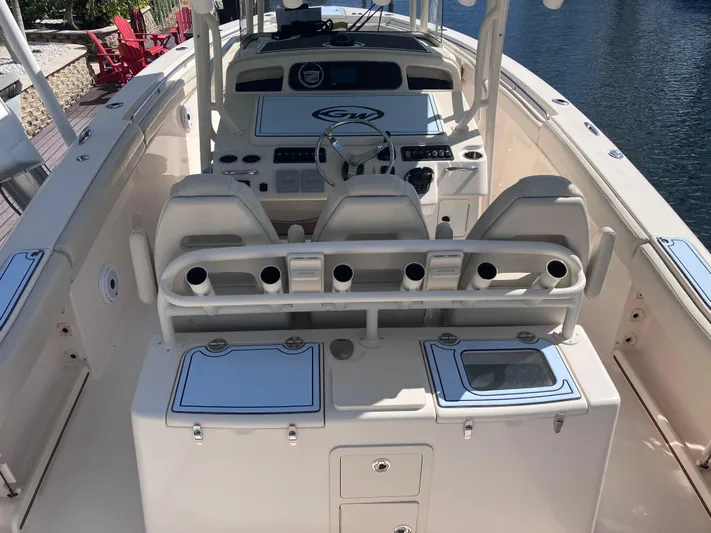  Yacht Photos Pics 2018 Grady-White Canyon 336 boat interior with helm and seating area.