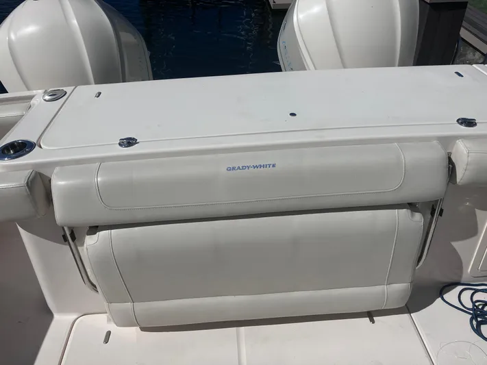  Yacht Photos Pics 2018 Grady-White Canyon 336 boat, rear seating area with visible outboard engines.
