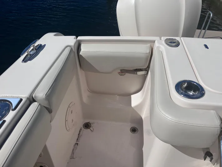 Yacht Photos Pics 2018 Grady-White Canyon 336 boat interior with white seating and cup holders.