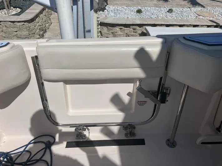  Yacht Photos Pics 2018 Grady-White Canyon 336 boat interior with seating and stainless steel fixtures.