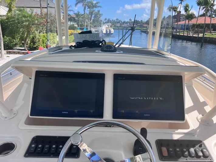  Yacht Photos Pics 2018 Grady-White Canyon 336 boat dashboard with dual Garmin displays.