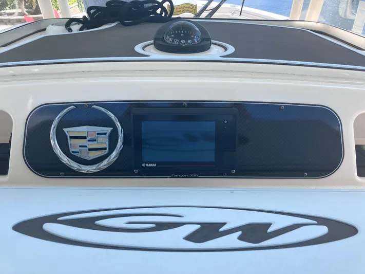  Yacht Photos Pics 2018 Grady-White Canyon 336 dashboard with compass and electronic display.
