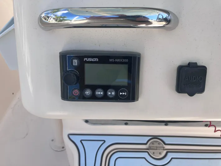  Yacht Photos Pics Fusion MS-NRX300 audio system on 2018 Grady-White Canyon 336 boat dashboard.