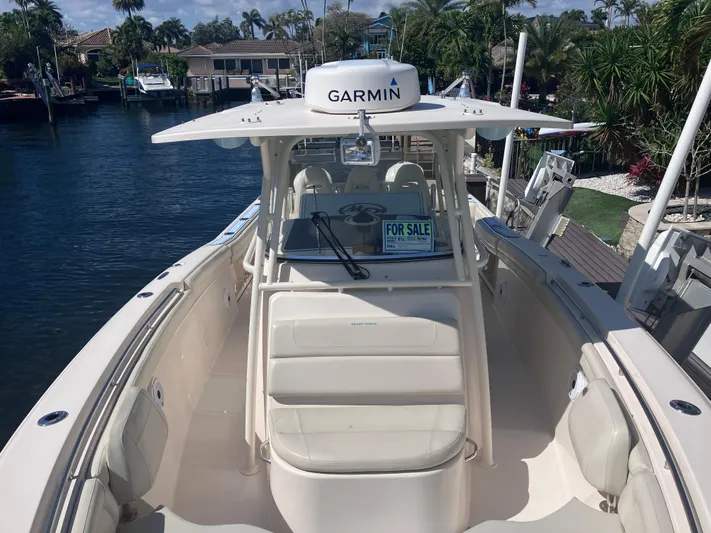  Yacht Photos Pics 2018 Grady-White Canyon 336 boat with Garmin equipment, for sale at a waterfront location.