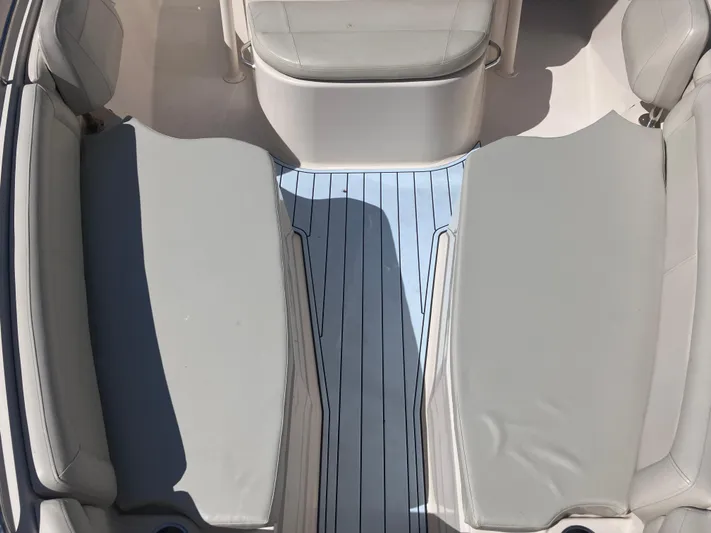  Yacht Photos Pics Interior seating of 2018 Grady-White Canyon 336 boat, featuring light gray cushions.