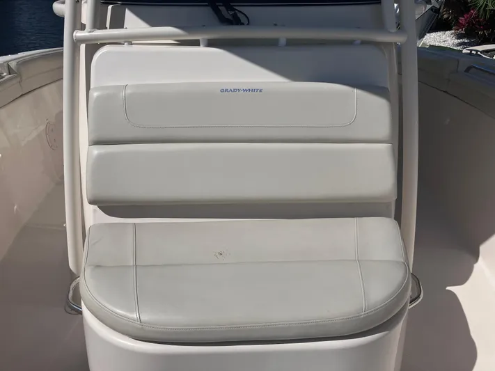  Yacht Photos Pics 2018 Grady-White Canyon 336 boat seating, featuring white cushioned seats.
