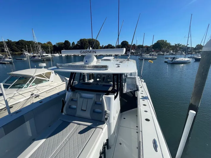 Tunnel Vision Yacht Photos Pics 2024 Freeman 42LR boat docked in a marina with clear blue skies.