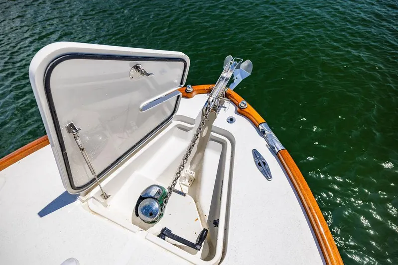  Yacht Photos Pics Bow of 2004 Hinckley Talaria 29 R with anchor and open hatch.