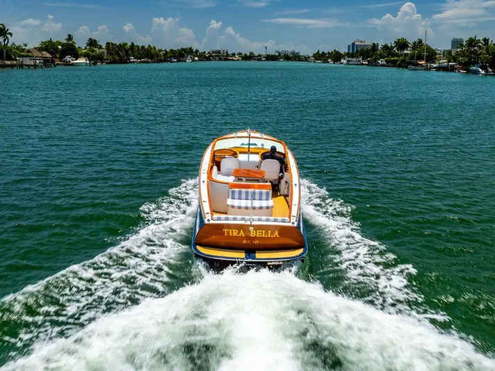  Yacht Photos Pics Hinckley Talaria 29 R boat cruising on a sunny day, 2004 model.