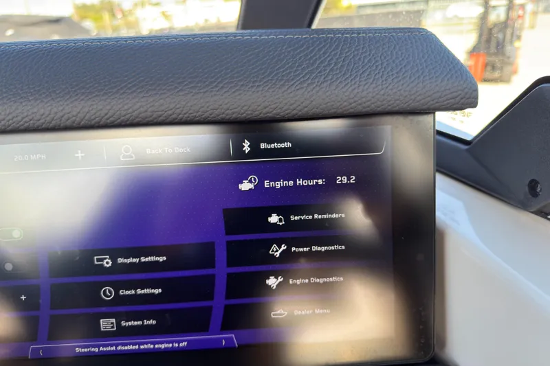  Yacht Photos Pics 2025 Nautique Super Air Nautique G25 Paragon dashboard displaying engine hours and settings.