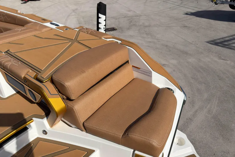  Yacht Photos Pics 2025 Nautique Super Air Nautique G25 Paragon boat with tan seating and deck details.