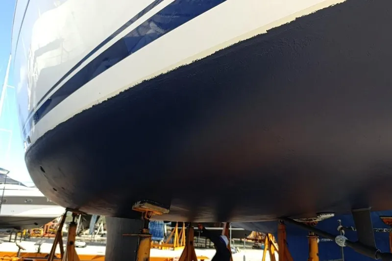  Yacht Photos Pics 2004 Jeanneau Sun Odyssey 43 sailboat hull on stands in a boatyard.