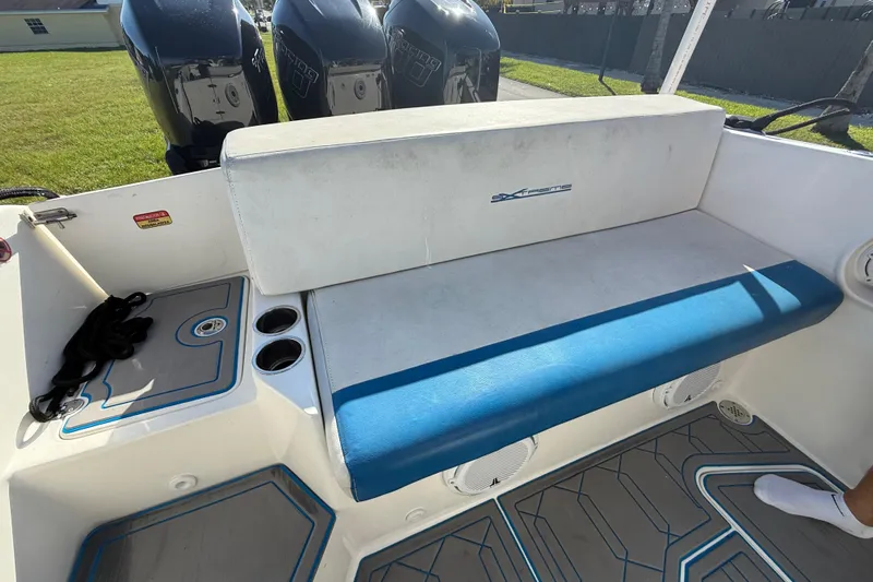  Yacht Photos Pics 2016 Extreme Boats 38 Cuddy Cabin interior with seating and outboard motors.