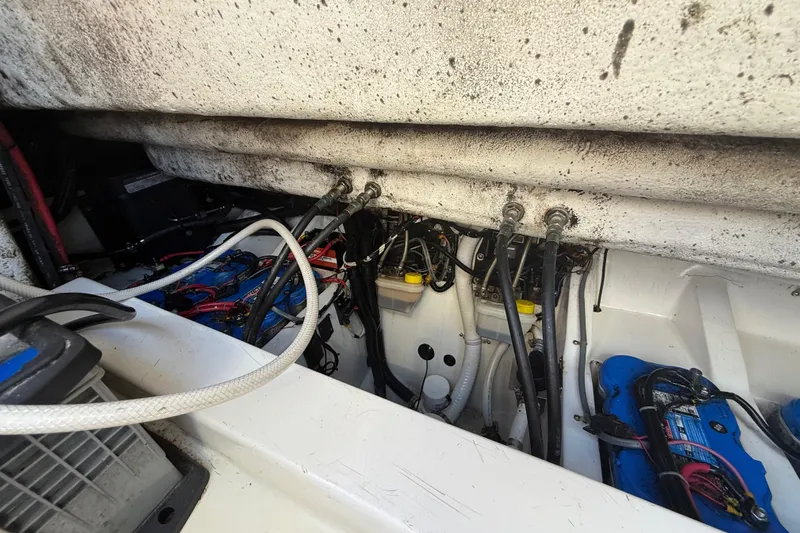  Yacht Photos Pics Engine compartment of 2016 Extreme Boats 38 Cuddy Cabin, showing wiring and components.