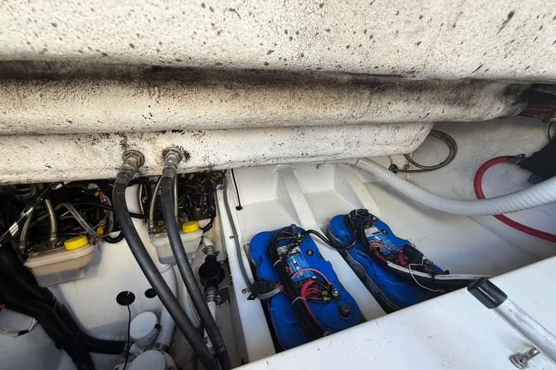  Yacht Photos Pics Engine compartment of 2016 Extreme Boats 38 Cuddy Cabin with visible wiring and components.