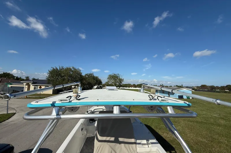  Yacht Photos Pics 2016 Extreme Boats 38 Cuddy Cabin on trailer under clear blue sky.