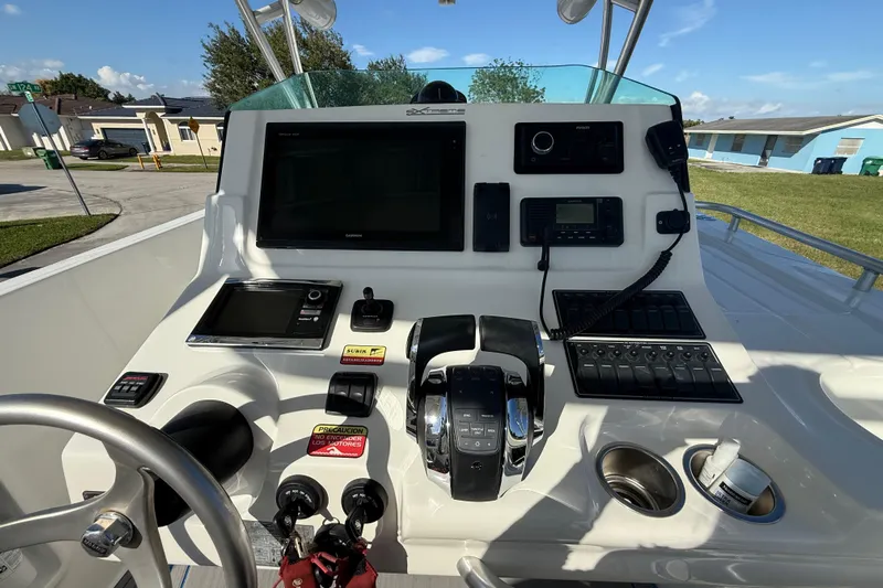  Yacht Photos Pics Control panel of a 2016 Extreme Boats 38 Cuddy Cabin with navigation equipment.