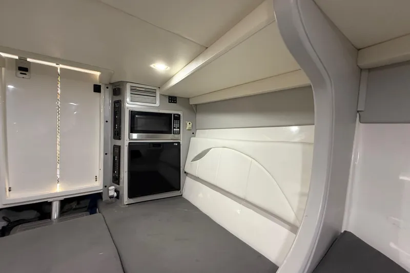  Yacht Photos Pics Interior of 2016 Extreme Boats 38 Cuddy Cabin with modern amenities.