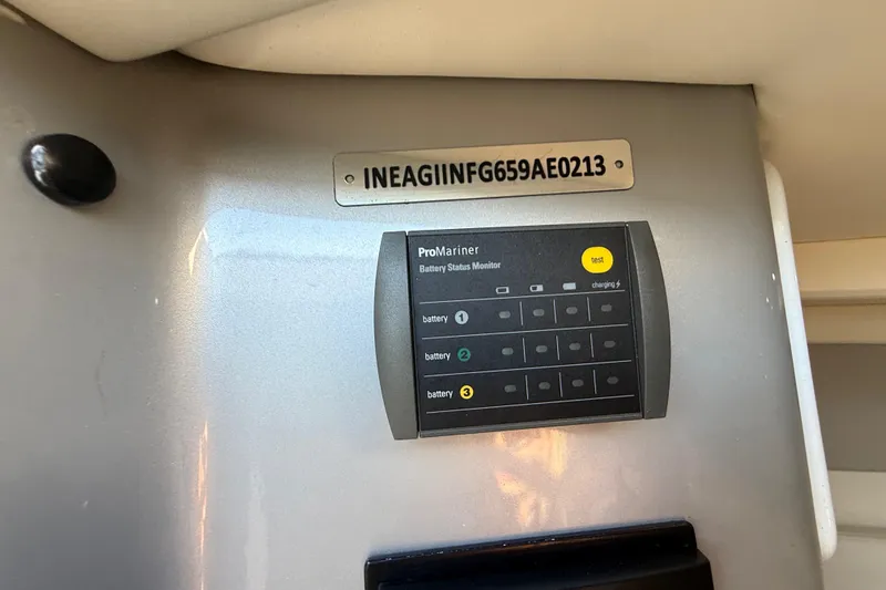  Yacht Photos Pics Battery status monitor on 2016 Extreme Boats 38 Cuddy Cabin dashboard.