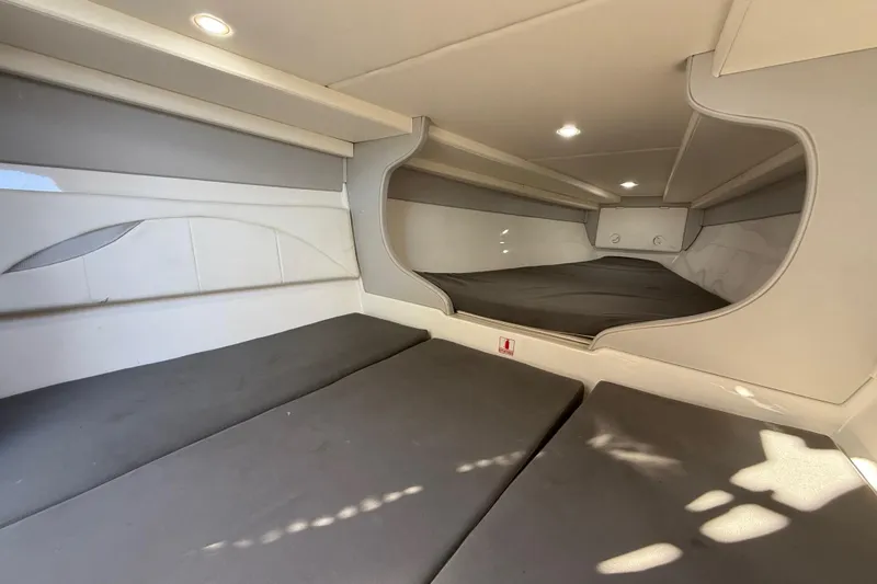  Yacht Photos Pics 2016 Extreme Boats 38 Cuddy Cabin interior with modern design and comfortable sleeping area.