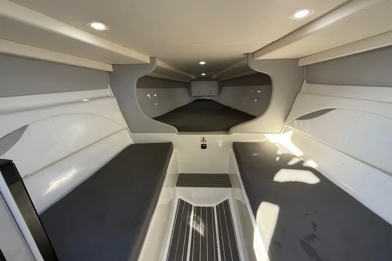  Yacht Photos Pics 2016 Extreme Boats 38 Cuddy Cabin interior with sleek design and comfortable seating.