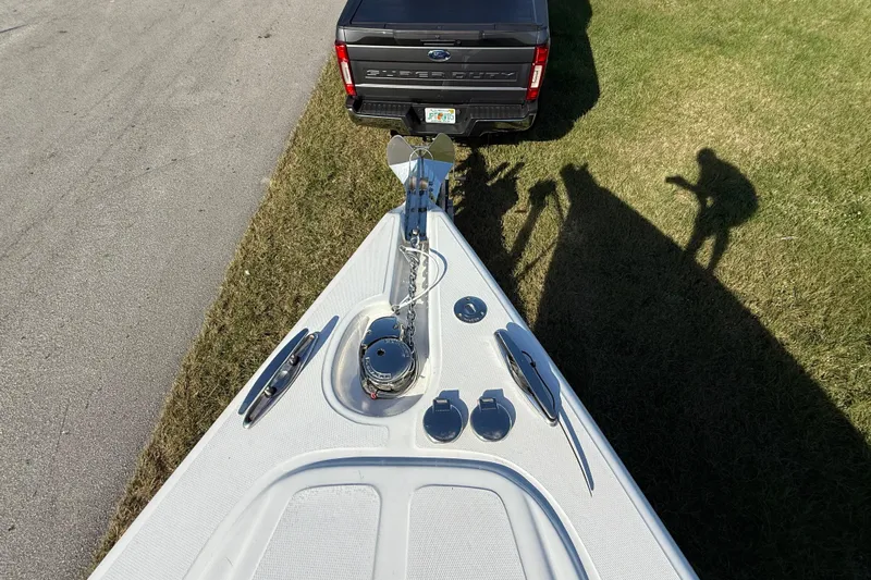  Yacht Photos Pics 2016 Extreme Boats 38 Cuddy Cabin hitched to a truck on grass.