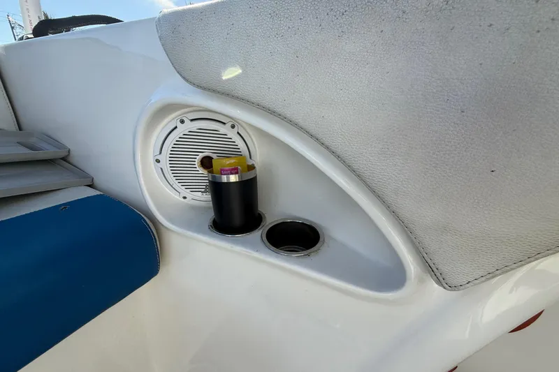  Yacht Photos Pics Cup holder and speaker on 2016 Extreme Boats 38 Cuddy Cabin interior.