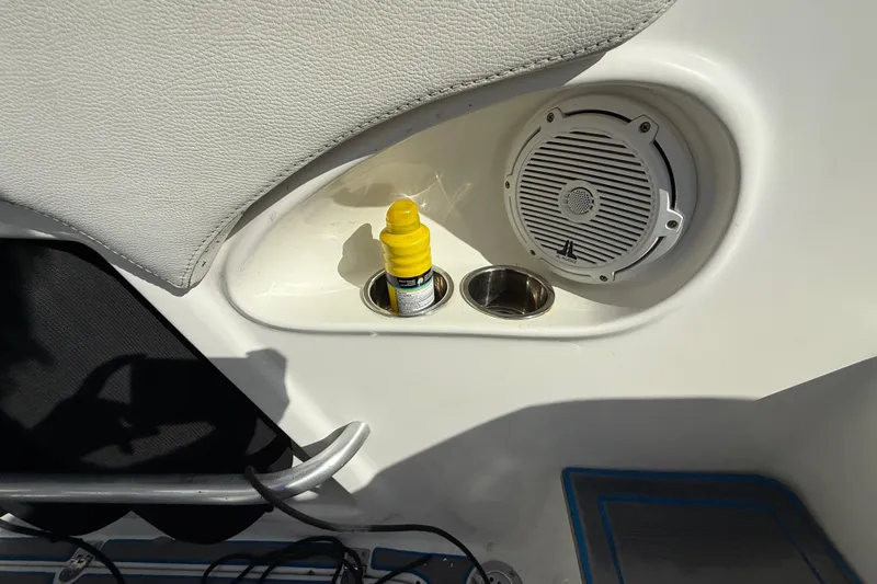  Yacht Photos Pics Interior of 2016 Extreme Boats 38 Cuddy Cabin with speaker and cup holder.