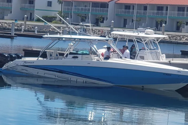 Yacht Photos Pics 2016 Extreme Boats model docked at marina with people onboard.