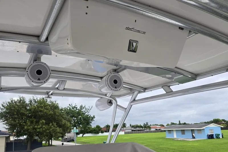  Yacht Photos Pics 2016 Extreme Boats model with mounted speakers and canopy, outdoor setting.
